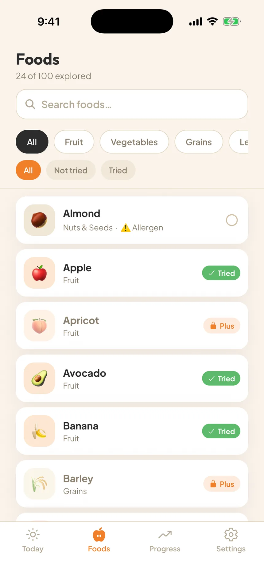 The food library showing foods grouped by category with filters for fruit, vegetables and grains, and tags marking which have been tried.